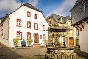 Moselle Wine Prints: Old fountain and winery in the old town of Kues