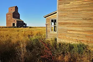 Elevator Prints: Old general store and grain elevator in ghost town Bents Saskatchewan, Canada