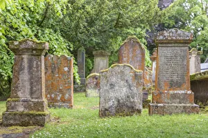 Aryll And Bute Prints: Old gravestones in the cemetery in the village of Luss, Loch Lomand, Aryll and Bute
