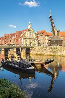 Hanseatic League Prints: Old harbor on the Ilmenau, in the background old crane and old department store