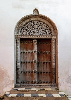 Carved Prints: Old heavy carved wooden door, Stonetown, Zanzibar, Tanzania