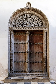 Old heavy carved wooden door, Stonetown, Zanzibar, Tanzania