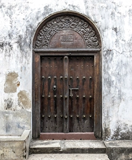 Carved Prints: Old heavy carved wooden door, Stonetown, Zanzibar, Tanzania