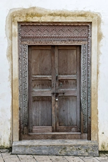 Zanzibar Prints: Old heavy carved wooden door, Stonetown, Zanzibar, Tanzania