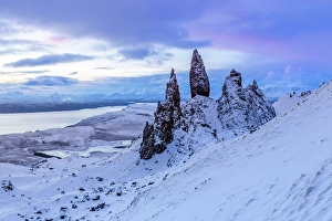 Snow Covered Prints: Old Man of Storr and snow covered landscape