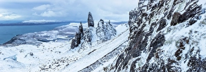Bleak Prints: Old Man of Storr and snow covered landscape