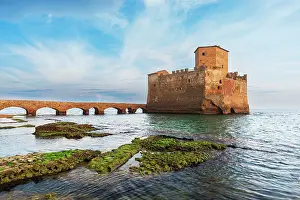 Tyrrhenian Prints: The old narrow bridge leading to the medieval castle of Torre Astura with roman ruins