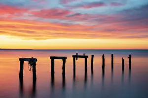 Dock Prints: Old pier pillars at sunrise on Cape Cod, Falmouth Heights, Massachusetts, USA