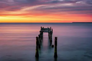Dock Prints: Old pier pillars at sunrise on Cape Cod, Falmouth Heights, Massachusetts, USA