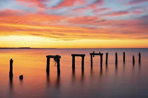 Dock Prints: Old pier pillars at sunrise on Cape Cod, Falmouth Heights, Massachusetts, USA