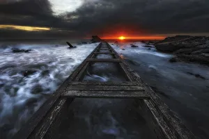 Livorno Prints: An old pier along the Tuscan coast near Livorno at sunset, Tuscany, Italy