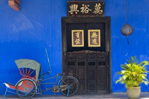 Old rickshaws & house front, Georgetown, Penang, Malaysia