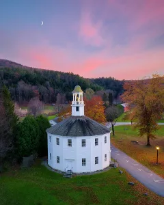 Vermont Prints: The Old Round Church at sunset in autumn with quarter moon, Richmond, Vermont, USA