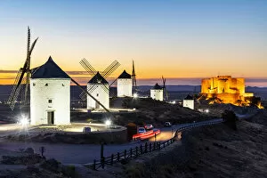 Images Dated 26th August 2021: Old Spanish windmills at sunset, Consuegra, Castilla-La Mancha, Spain
