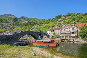Rijeka Crnojevica Prints: The Old Stari Most Bridge over the Crnojevic River in Rijeka Crnojevica, Montenegro