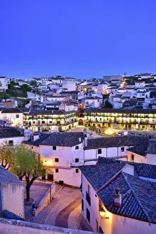 The old town of Chinchon with the 15-17th century Plaza Mayor at dusk. Castilla la Mancha