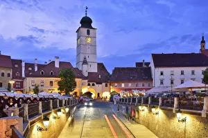 Old Town Hall Tower (Council Tower) and Piata Mica at dusk. Sibiu, Transylvania. Romania