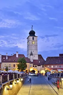 Old Town Hall Tower (Council Tower) and Piata Mica at dusk. Sibiu, Transylvania. Romania