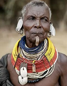 African Woman Gallery: An old Turkana woman wearing all the finery of her tribe