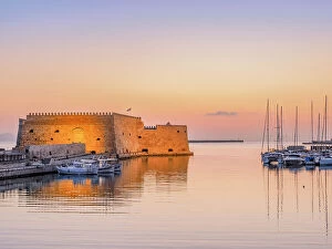 Yacht Collection: Old Venetian Port and The Koules Fortress at dawn, City of Heraklion, Crete, Greece