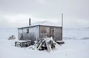 Svalbard Prints: Old wooden cabin in 1950s research station. Kinnvika, Spitsbergen, Svalbard, Norway