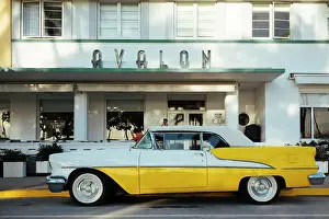 Automobile Prints: Oldsmobile Super 88 convertible parked in front of the Avalon Hotel
