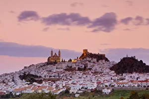 Olvera illuminated at sunrise, Olvera, Cadiz Province, Andalusia, Spain Olvera illuminated at sunrise, Olvera, Cadiz Province, Andalusia, Spain