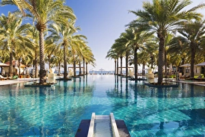 Oman. Muscat Governorate, Muscat. The 50 metre infinity pool at the Ritz Carlton