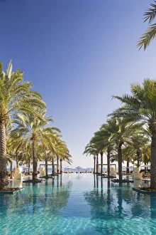 Oman. Muscat Governorate, Muscat. The 50 metre infinity pool at the Ritz Carlton Al