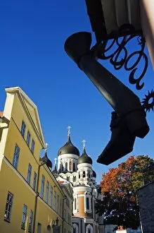 Tallinn Collection: An Ornamental Steel Boot hangs infront of the 19th