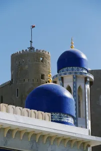 Muscat Prints: The ornate domes and minaret of the Khor Mosque contrast