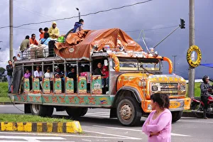 Overloaded bus on the Panamericana Highway, near Popayan, Colombia, South America