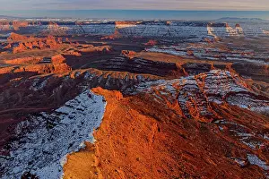 Eroded Rock Prints: Overlooking snow covered eroded sandstone formations in the Colrado River canyon below Dead Horse Point