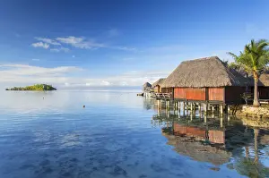 French Polynesian Prints: Overwater bungalows of Sofitel Hotel with Sofitel Private Island in background, Bora Bora