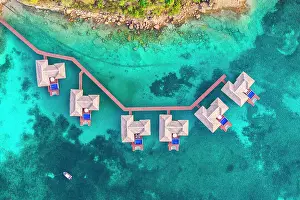 Rooftop Prints: Overwater luxury bungalows with private pool in the crystal clear sea