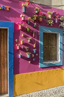 Painted door, window and walls for the Art of Open Doors project in Santa Maria street
