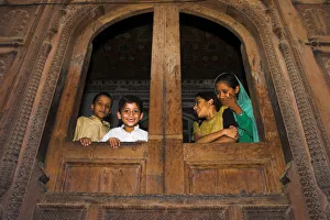 Pakistan Prints: Pakistan, North West Frontier Province, Peshawar, Children looking out of windows