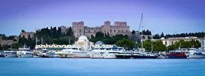 Images Dated 23rd February 2012: Palace of the Grand Masters & Mandraki Harbour illuminated at dawn, Rhodes Town, Rhodes