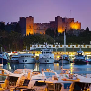 Images Dated 23rd February 2012: Palace of the Grand Masters & Mandraki Harbour illuminated at dusk, Rhodes Town