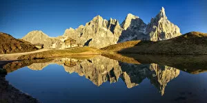 Pale di San Martino Reflecting in Lake, Passo Rolle, Dolomites, Italy