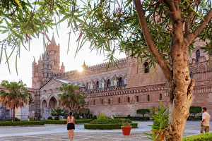 Sicilia Gallery: Palermo, Sicily. Tourists visiting the baroque Cathedral at sunset
