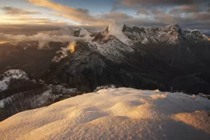 The Pania della Croce and Pania Secca seen from the Monte Croce during a winter sunset in