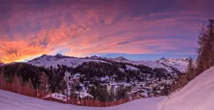 Valchiavenna Prints: Panorama of the alpine village of Madesimo and snowy ski slopes at sunset Spluga