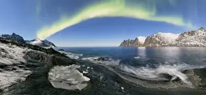 Tungeneset Prints: Panorama of frozen sea and rocky peaks illuminated by the Northern Lights Tungeneset