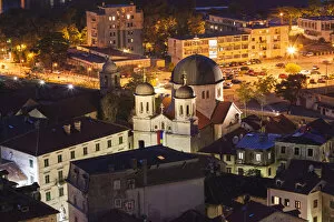 Kotor Collection: Panorama of Kotor at night with a detail on the Orthodox Church of St