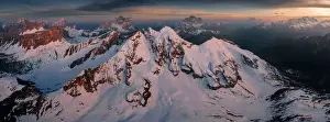 Elevated Prints: A panoramic aerial view taken from the Giau Pass during an early spring sunset