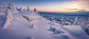 Day Dreaming Prints: Panoramic of ice sculptures wrapped in snow surrounding the arctic village of Pudasjarvi at sunrise