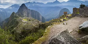 Panoramic view of historic ancient Incan Machu Picchu on mountain in Andes, Cuzco Region