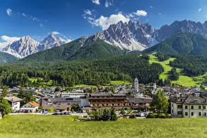 Panoramic view over San Candido Innichen with Dolomites behind, Alto Adige or South Tyrol