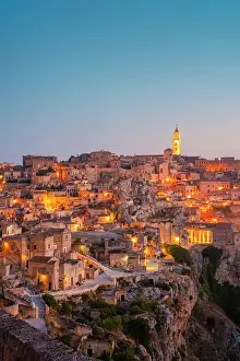 Basilicata Prints: Panoramic view of Sasso Caveoso of Matera at dusk. Matera, Basilicata, Italy